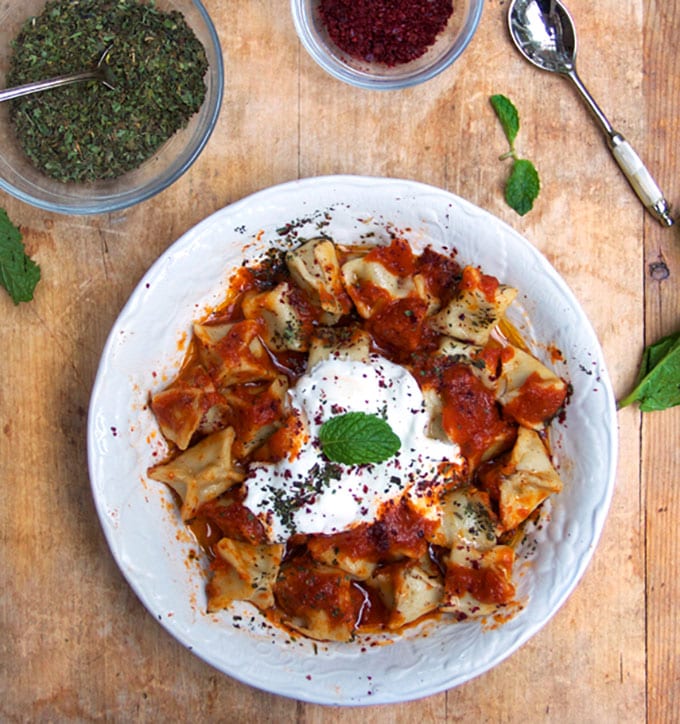 Turkish Manti: Tiny lamb-stuffed raviolis with three sauces - caramelized tomato sauce, brown butter sauce, garlicky yogurt sauce. A stellar dish for a special occasion | Panning The Globe