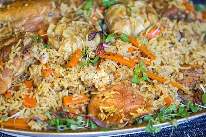 Chicken Plov: a scrumptious chicken and rice casserole recipe from Uzbekistan, with lots of carrots, onions, herbs and delicious spices l www.panningtheglobe.com 