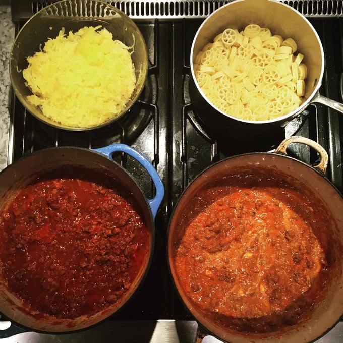 two pots of turkey ragu and a pot of noodles and a pot of spaghetti squash