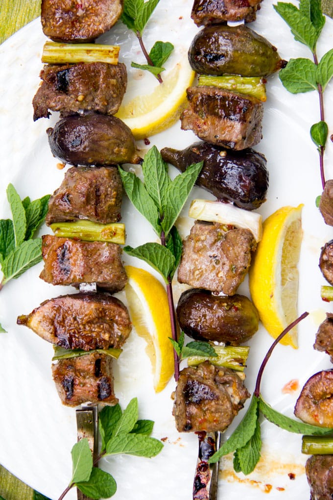 Grilled Lamb and Fig Skewers - Here’s a kebab recipe for your next barbecue – grilled skewers of lamb and fresh figs with a sweet, spicy, minty glaze. The subtle sweet flavor of grilled figs is so delicious with the charred rich grilled lamb. The glaze takes it over the top.
