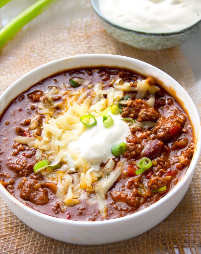 bowl of Eddie's award winning chili with toppings