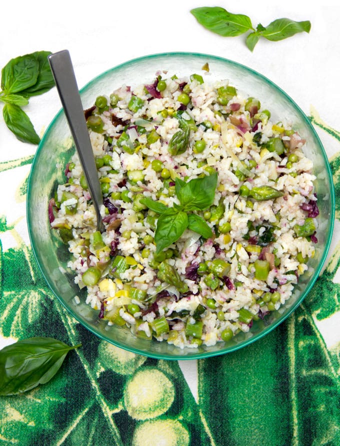 A delicious Mediterranean rice salad with fresh veggies, Pecorino cheese and lemony dressing. This is my idea of the perfect summer side dish recipe. It complements almost any main dish and is especially great with anything grilled. Plus it’s vegetarian and gluten-free.