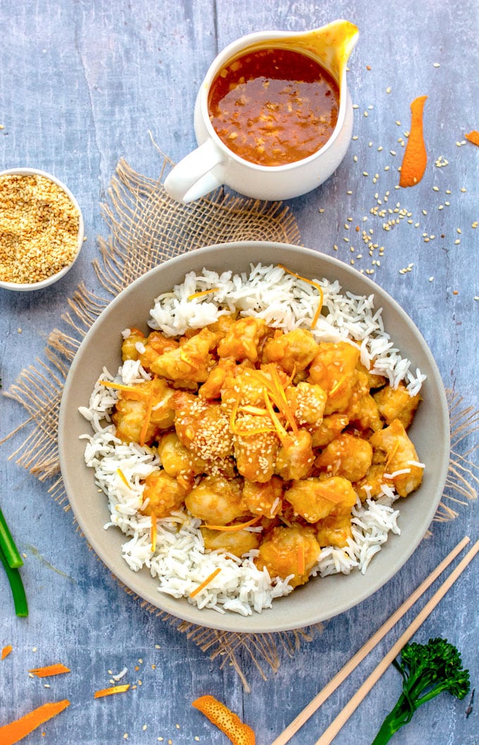An easy recipe for homemade Chinese Orange Chicken. Crispy coated tender chicken with sweet and sour orange glaze. [Not deep-fried] [gluten-free] #Chinese #OrangeChicken #Recipe