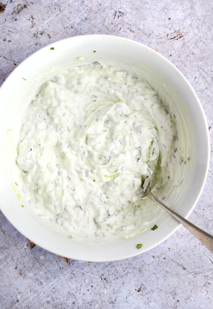 Cucumber Raita - a cooling, refreshing yogurt-based side dish to serve with hot and spicy Indian food. A quick and easy recipe l www.panningtheglobe.com
