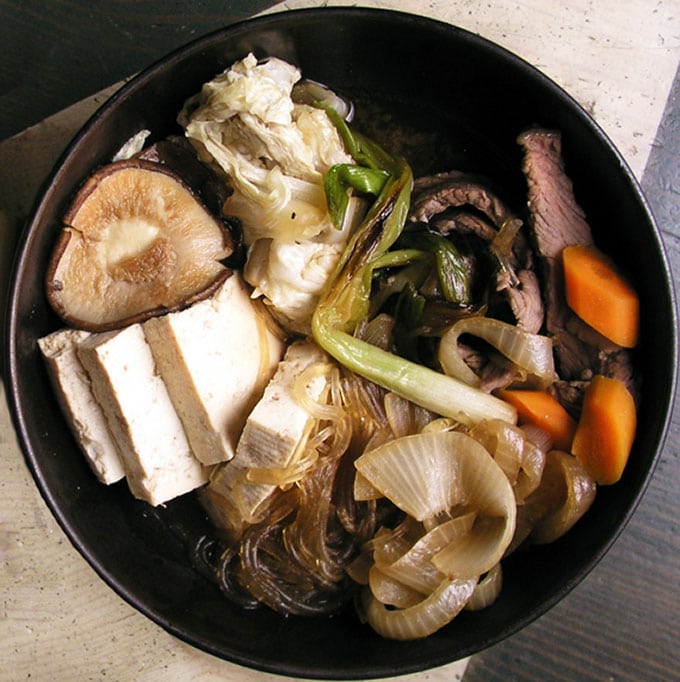 Sukiyaki: Japanese hot pot with beef, tofu, rice noodles and vegetables