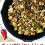 pinterest pin: cast iron skillet filled with sauteed brussels sprouts