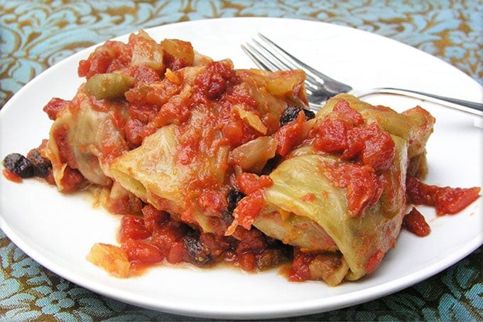 Russian Stuffed Cabbage: Ground beef with rice and vegetables, wrapped in cabbage leaves and braised in a sweet and sour tomato sauce - step by step instructions | Panning The Globe