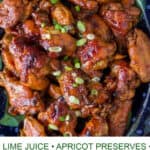 pinterest pin: close up of a bunch of lime-apricot baked chicken wings topped with chopped scallions