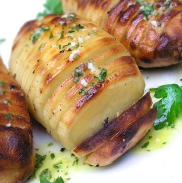 Hasselback Potatoes with Lemon Garlic Dijon Vinaigrette Baked in. Crisp on the outside, creamy inside, bursting with flavor.