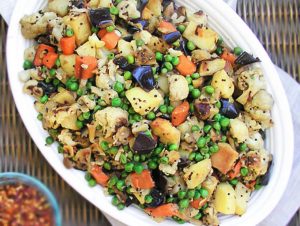 Roasted Vegetables get a delicious boost of flavor with spices from Zanzabar. Carrots, potatoes, eggplant and cauliflower, roasted then briefly stewed with peas and exotic African spices.