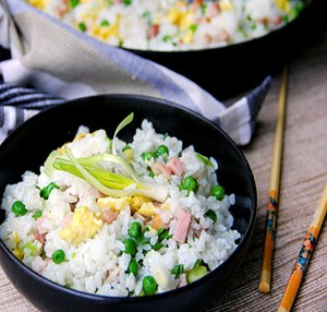 This authentic Chinese ham and egg fried rice recipe has only 5 ingredients, plus oil to stir-fry and salt to season, and no soy sauce. You haven't tasted great fried rice until you've tried this recipe. It's the absolute best!