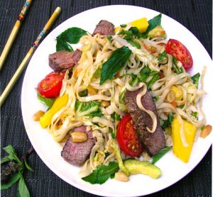 This Thai Steak and Noodle Salad is a one-dish dinner salad with avocado, mango, basil, rice noodles, peanuts...it's got that famous Thai balance of sweet, sour, spicy, tangy, tender, crunchy, delicious!
