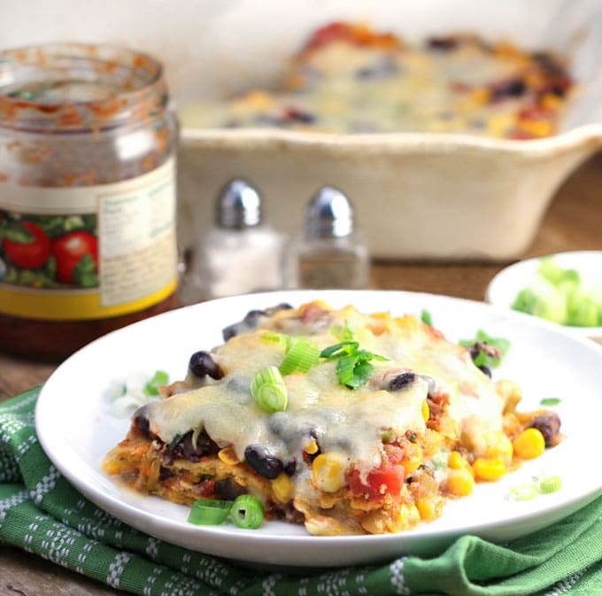 Slice of vegetarian tortilla casserole on a plate 