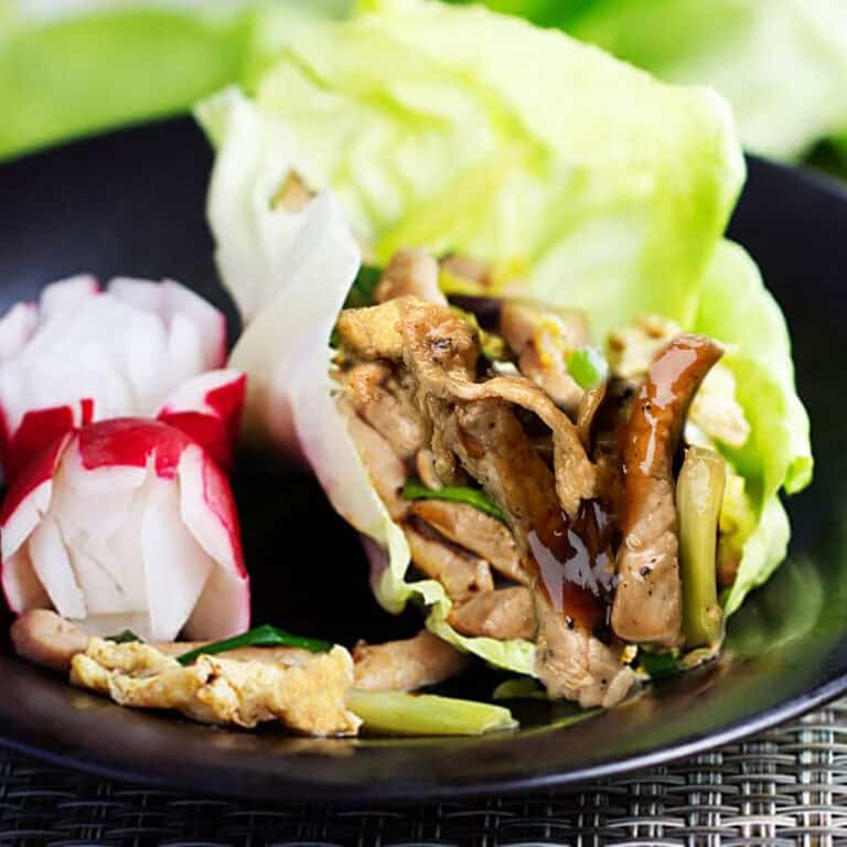 thin sliced stir-fried pork, cabbage, eggs, scallions and mushrooms wrapped in a lettuce leaf with hoisin sauce