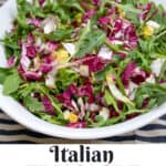 Pinterest pin: Italian Tricolore salad in a white bowl with wooden salad forks