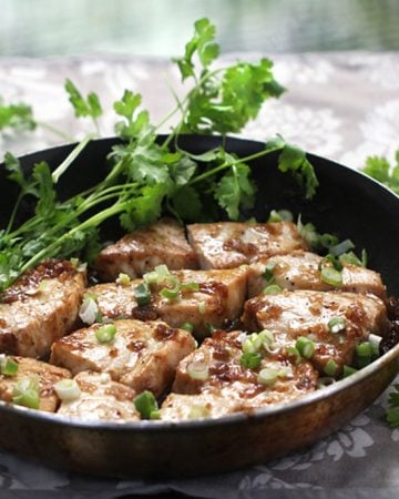 Caramelized Black Pepper Fish from Vietnam is an excellent dish that's easy to cook at home. There aren’t a lot of ingredients – the flavor comes from caramelized sugar, fish sauce, shallots, and lots of black pepper. The recipe is quick enough for a weeknight and delicious enough for a special occasion.