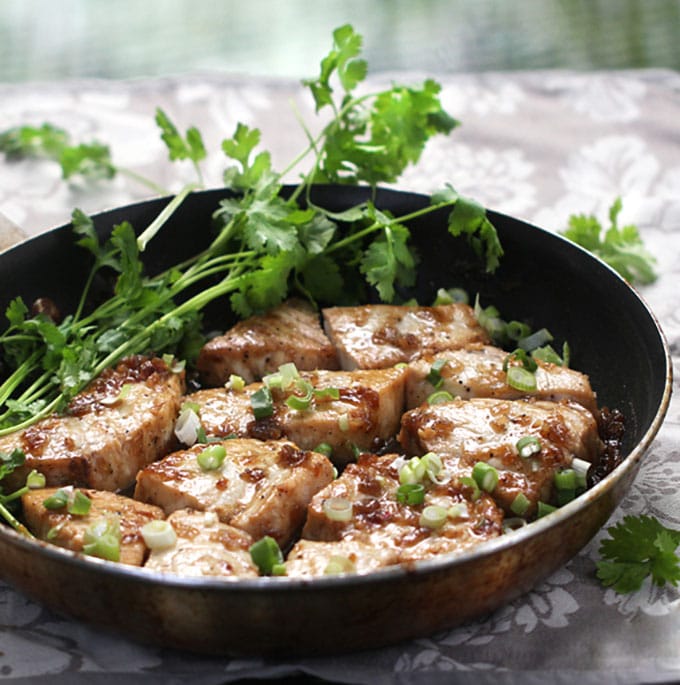 Caramelized Black Pepper Fish from Vietnam is an excellent dish that's easy to cook at home. There aren’t a lot of ingredients – the flavor comes from caramelized sugar, fish sauce, shallots, and lots of black pepper. The recipe is quick enough for a weeknight and delicious enough for a special occasion.