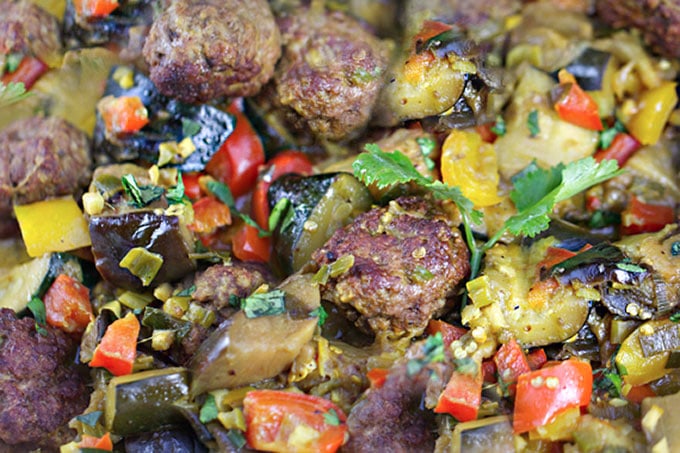 close up of lamb meatballs and ratatouille - an Indian Stew from Panning The Globe