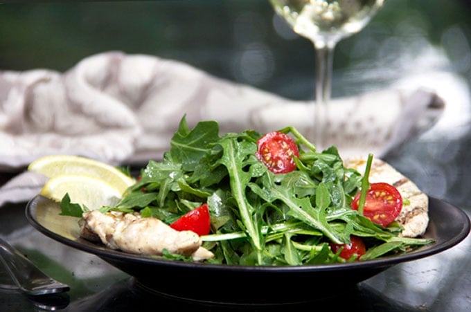 Chicken paillard is an Italian classic that's perfect for grilling season: thinly pounded chicken marinated in lemony dressing, grilled, and topped with arugula salad and more lemony dressing. It's a quick ad easy recipe that's satisfying, healthy, and delicious.