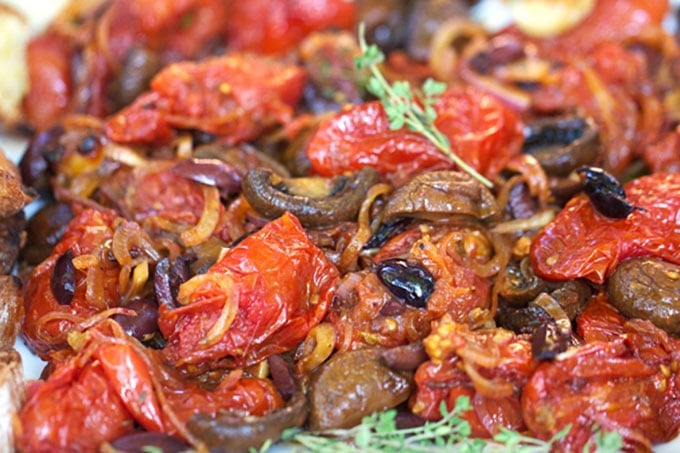 Roasted tomatoes and mushrooms with grilled bread is the absolute BEST spring and summer appetizer. It's like the most delicious bruschetta ever! - Panning The Globe Recipe