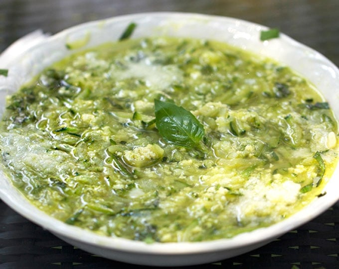 Close up bowl of Italian zucchini egg drop soup