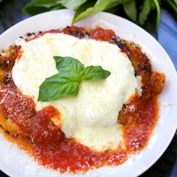 Chicken Parmesan - tender breaded chicken cutlets, crisp on the outside, drenched in delicious tomato sauce and topped with mozzarella cheese | Panning The Globe