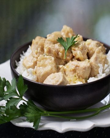 White Chicken Korma is a creamy, yogurt based curry that's beautifully spiced yet mild enough for the whole family. Serve with steamed white rice to soak up all the delicious sauce. It's a quick easy recipe. Dinner can be on the table in 35 minutes.