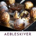 pinterest pin: silver platter topped with 8 aebleskiver pancakes and a little bowl of strawberry jam in the middle