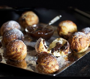 Aebleskivers are spherical pancakes from Denmark. They're extremely fun to make. You can fill them will delicious treats, sweet or savory. The room lights up with excitement when you bring out a platter of these festive pancake balls.
