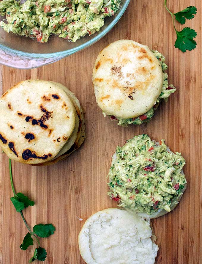 Venezuelan arepas stuffed with avocado chicken salad