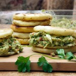 Arepas are gluten free corncakes, eaten in Venezuela in place of bread - crunchy outside, tender inside, filled with chicken or cheese or anything you like. This recipe pairs homemade arepas with scrumptious Venezuelan chicken and avocado salad.
