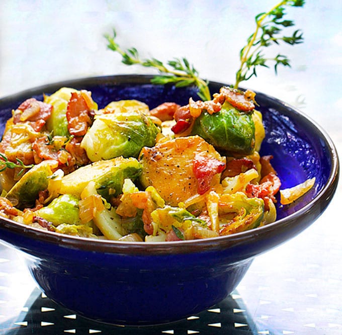 Skillet brussels sprouts, browned and caramelized with bacon, shallots & sherry vinaigrette. Super flavorful! This side dish is definitely worthy of a special occasion.