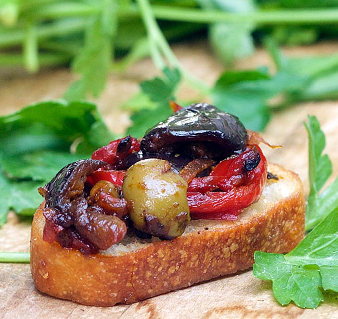 Caponata is a Sicilian Sweet and Sour Eggplant Relish that makes a fantastic topping for bruschetta. It's also great with simple grilled or broiled fish or chicken, or as a sauce for pasta. {vegan, gluten-free}
