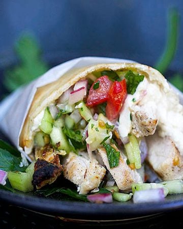 Here's a home-cooking recipe for the delectable Middle Eastern street food, Chicken Shawarma: spicy grilled chicken, Israeli chopped salad and lemony tahini sauce. Adapted from Yotam Ottolenghi and Cooking Light