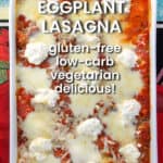 Eggplant lasagna in a casserole with tomato sauce and three cheeses on top.