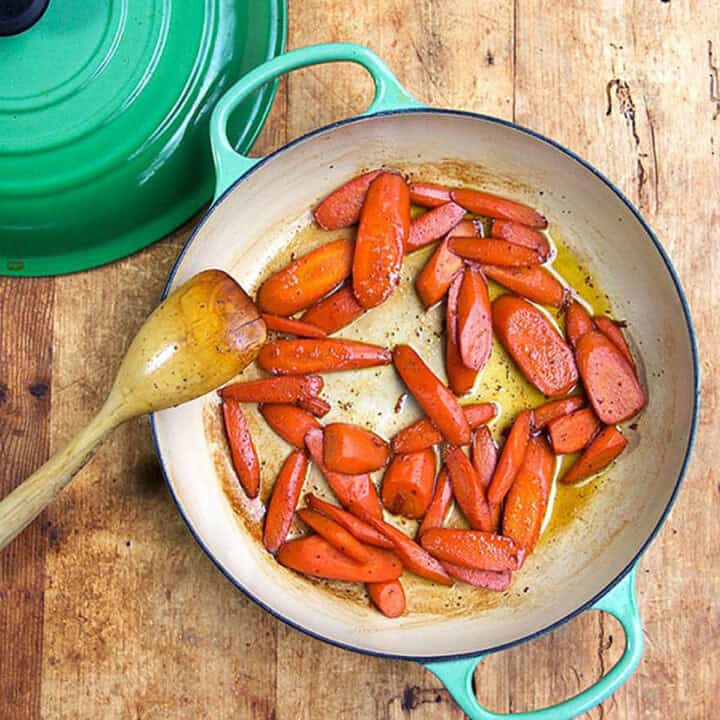 glazed carrots cooked in wine, in a dutch oven.