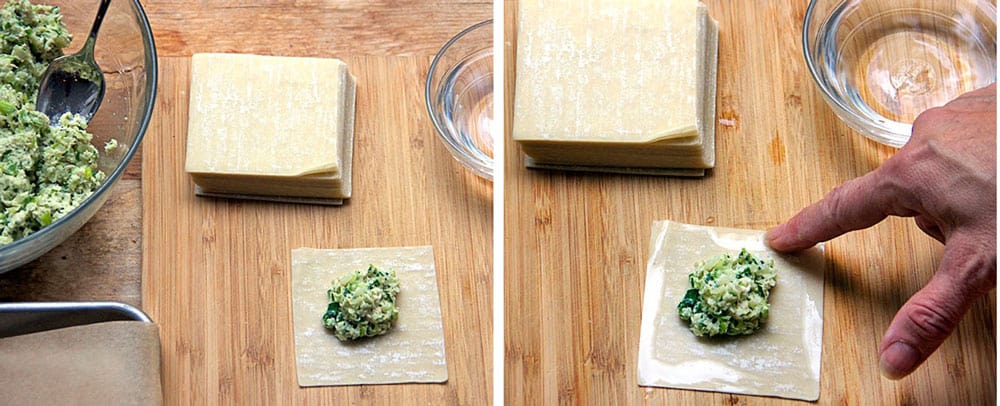 a stack of wonton wrappers with one on the cutting board toped with a blog of turkey kreplach stuffing