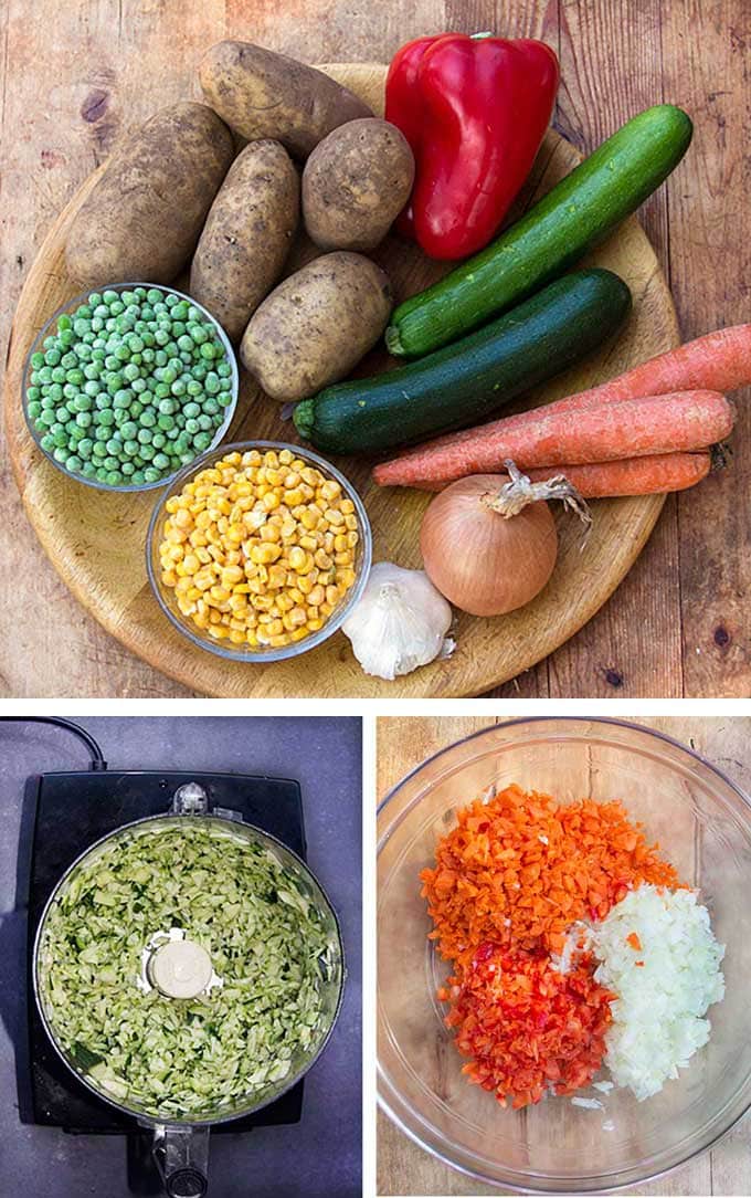 a round wooden tray with raw veggies for healthy shepherd's pie: potatoes, zucchini, carrots, onion, garlic, peas and corn and showing how to chop the zucchini, carrots, onions and peppers in a food processor.