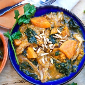 Moroccan chicken stew with sweet potatoes and apricots in a bowl