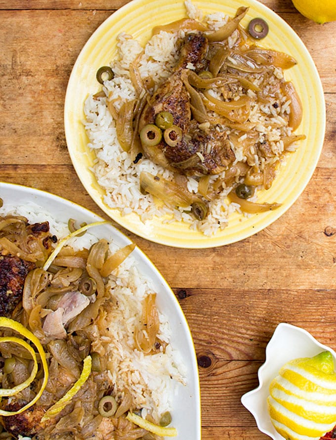 plates of rice toped with Senegalese chicken yassa