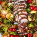 pinterest image: platter with sliced roasted pork tenderloin arranged down the center, surrounded by roasted potatoes, broccoli and cherry tomatoes.