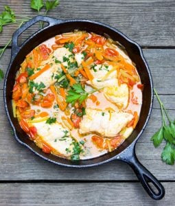 Fish in crazy water is a classic Neopolitan dish of fresh fish, poached with carrots, celery, onions and tomatoes. The fish is tender, the veggies are crisp-tender, the broth is sweet and delicious, and dinner is on the table in just 30 minutes.