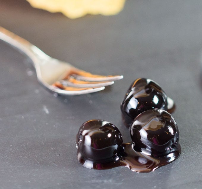 3 Luxardo Cherries and a small cocktail fork