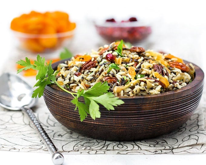 This wild rice salad is bejeweled with cranberries, apricots and pecans and dressed with orange shallot vinaigrette. It's a great holiday side dish recipe.