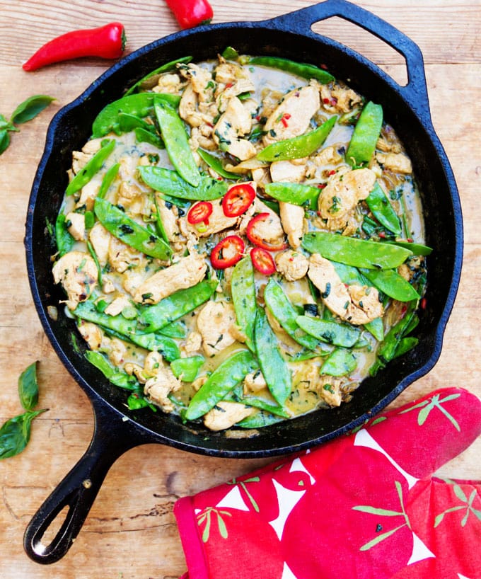 Fresh ginger, coconut milk and basil are the base of this fragrant Thai green curry chicken recipe. Fluffy white rice is all you need to complete the meal. Perfect for weeknights when you want something quick and delicious.