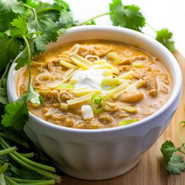 It's easy to cook a big pot of this award winning white chicken chili, and it's the absolute BEST white chicken chili! Tender chicken, chilies, white beans, spices and a few more goodies in this winning white chicken chili recipe.