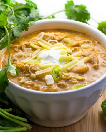 It's easy to cook a big pot of this award winning white chicken chili, and it's the absolute BEST white chicken chili! Tender chicken, chilies, white beans, spices and a few more goodies in this winning white chicken chili recipe.
