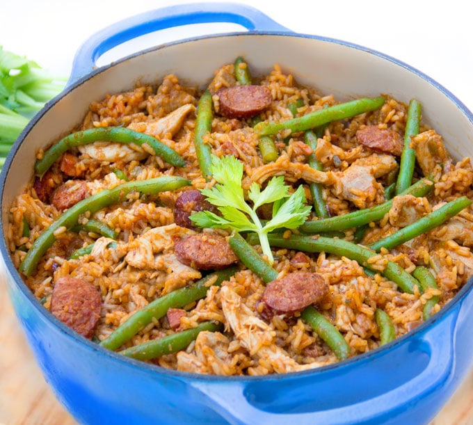 Spicy chicken jambalaya is the BEST New Orleans party food, perfect for feeding a crowd during Mardi Gras or for family and friends anytime. This jambalaya recipe is easy to cook at home and includes nutritious green beans for a well-rounded one pot dinner.