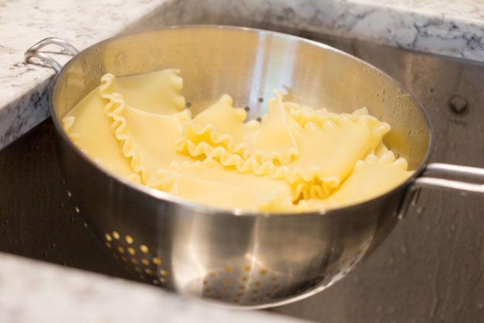 lasagna noodles draining in a colander