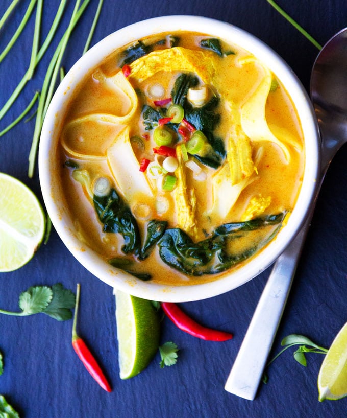 This creamy, fragrant Thai coconut curry chicken soup has spinach and rice noodles and everything you want for dinner, all in one pot! [gluten-free and dairy-free] 